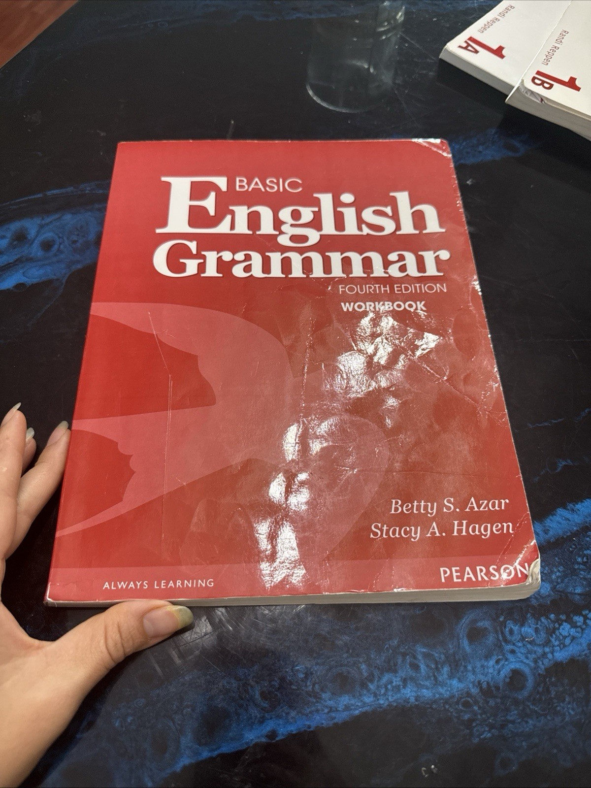 Basic English Grammar Workbook by Stacy Hagen and Betty Aza.