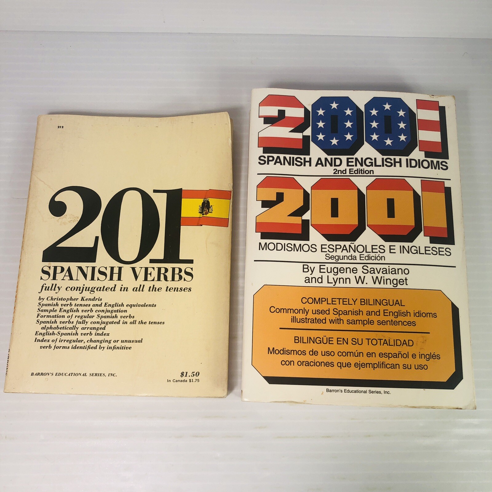 2 lot Spanish/English books 2001 Spanish & English Idioms and 201 Spanish Verbs