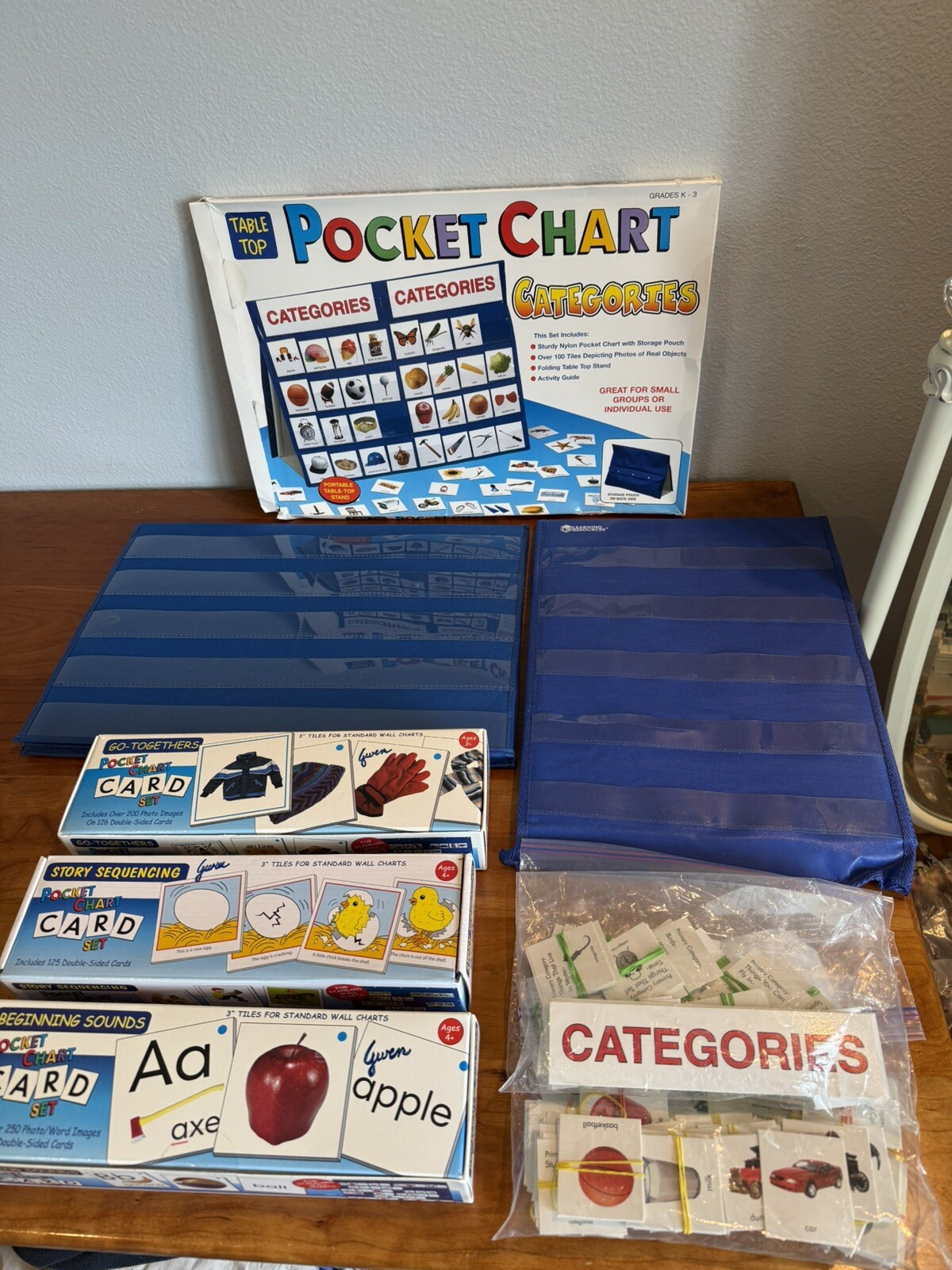 Large complete boxed sets of Pocket Chart language learning activities excellent
