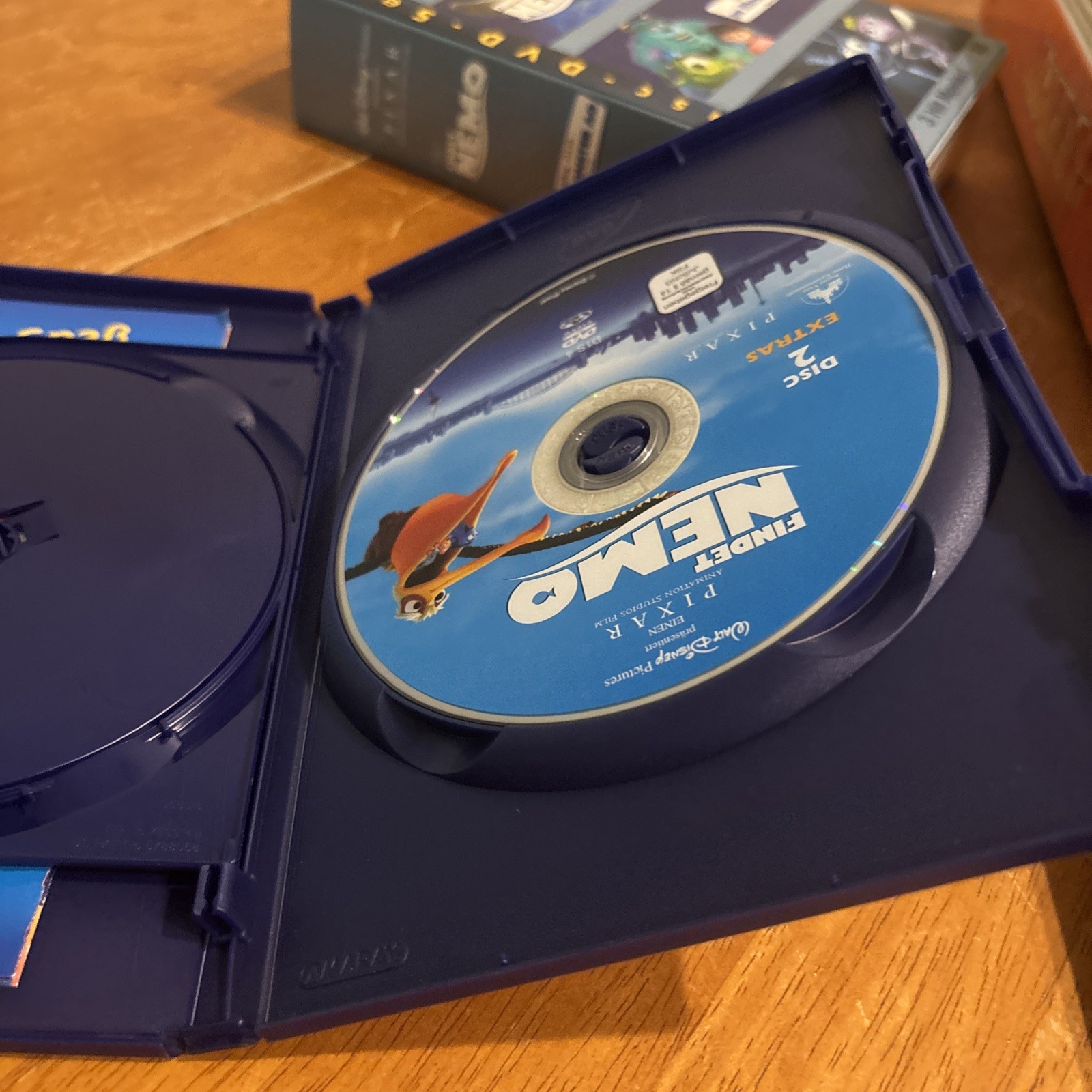 Learn German Bundle Muzzy/Findet Nemo Monsters Inc/3DVDs/books/Small DVD Player