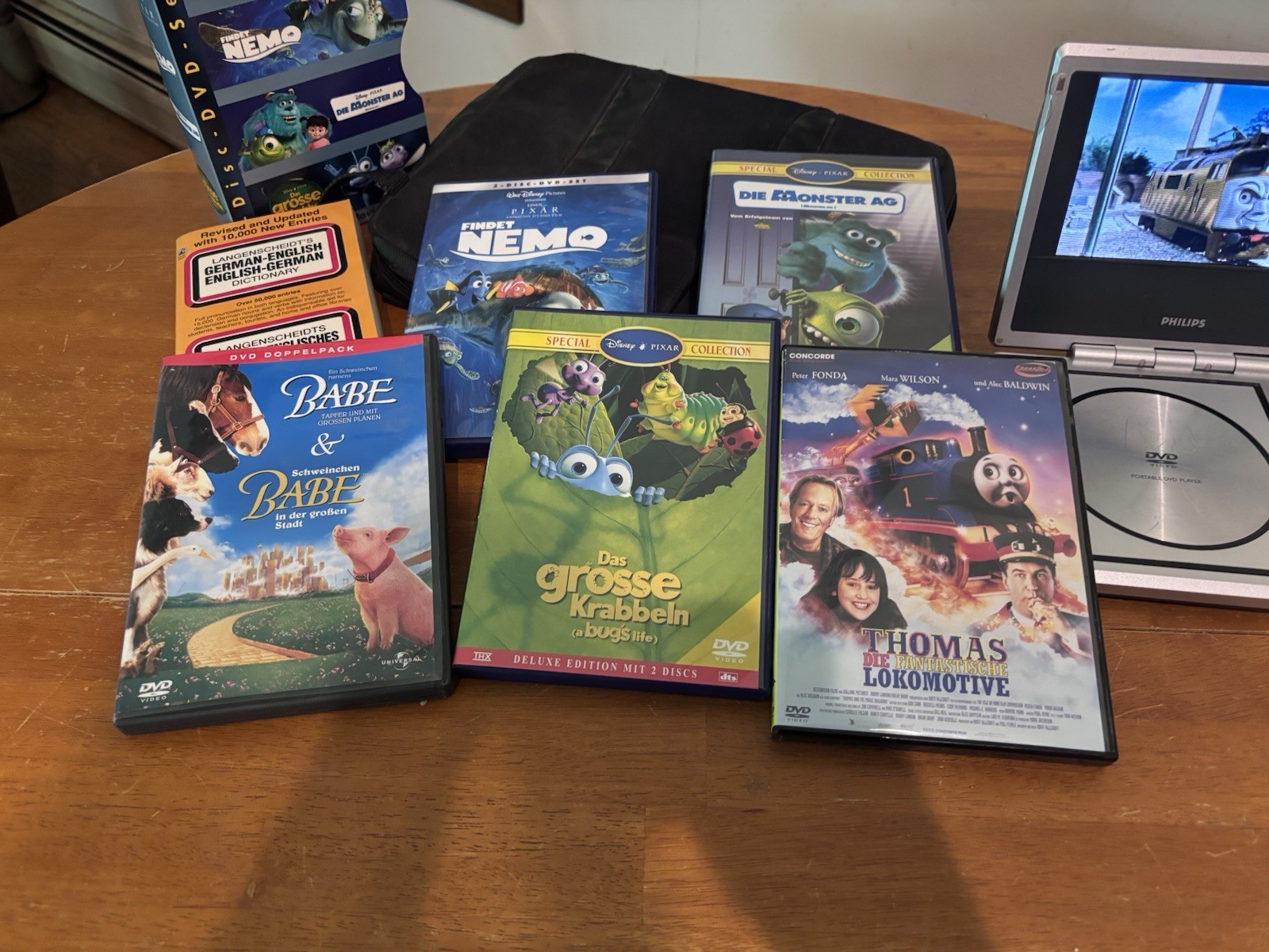 Learn German Bundle Muzzy/Findet Nemo Monsters Inc/3DVDs/books/Small DVD Player
